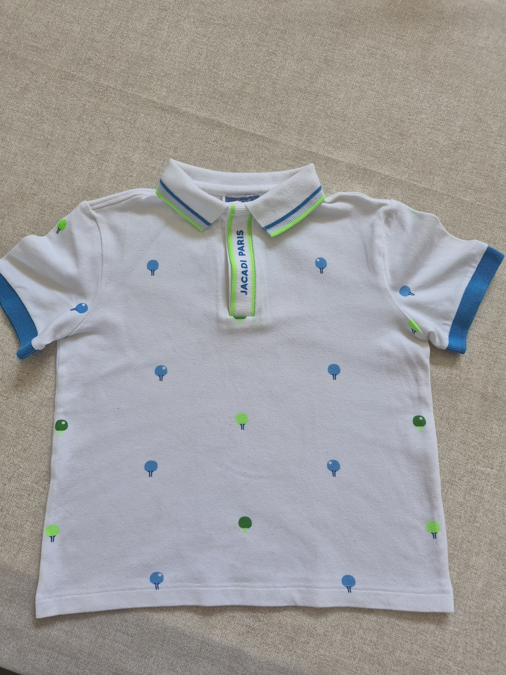 Jacadi White Polo with Blue and Lime Racket Pattern Details